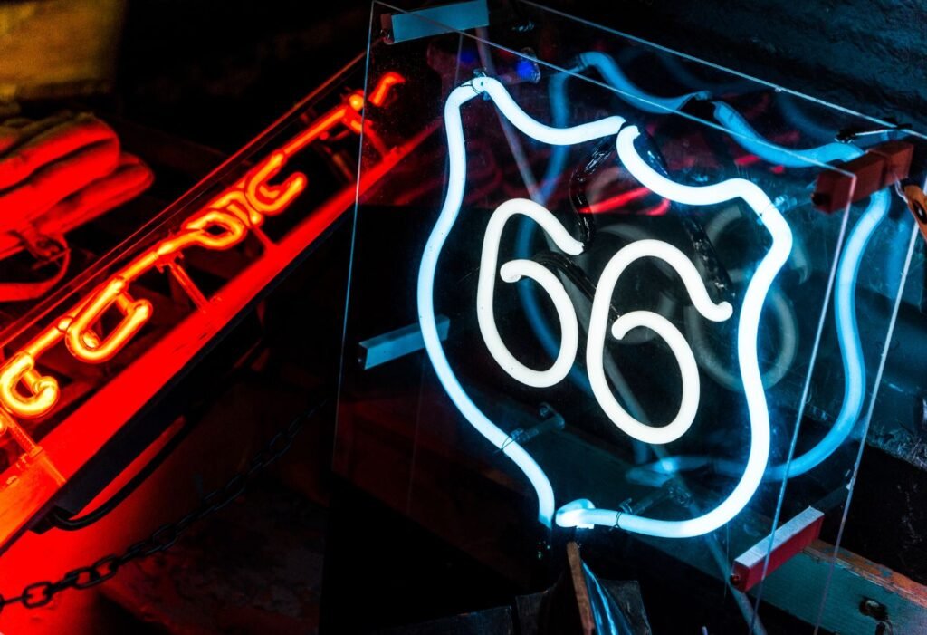 Vintage neon sign showcasing iconic Route 66 logo