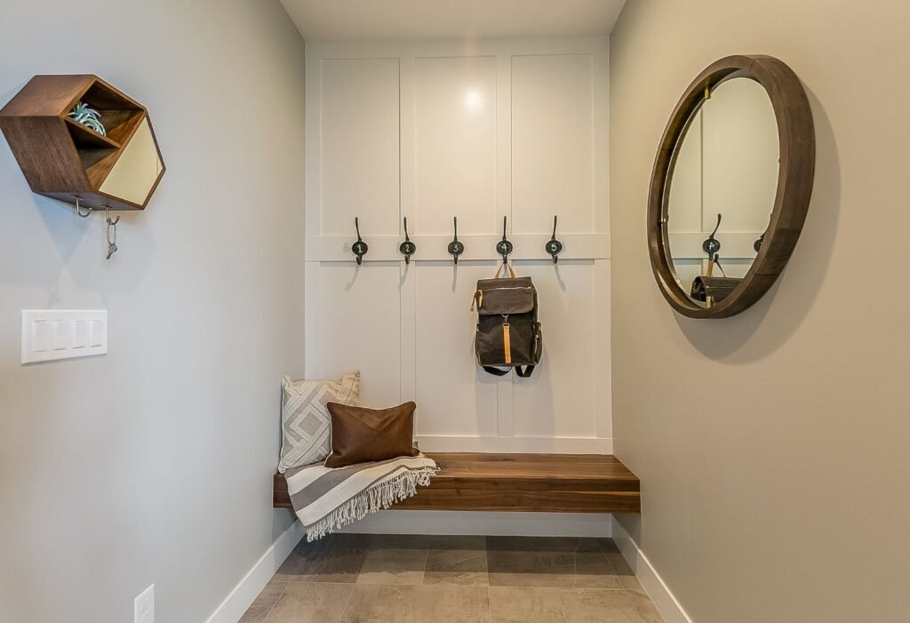 A stylish and functional DIY mudroom bench with storage underneath.