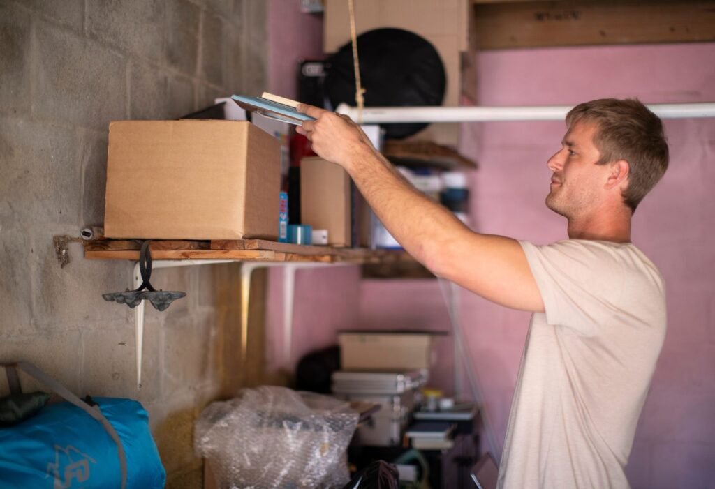 Men organizing in a garage