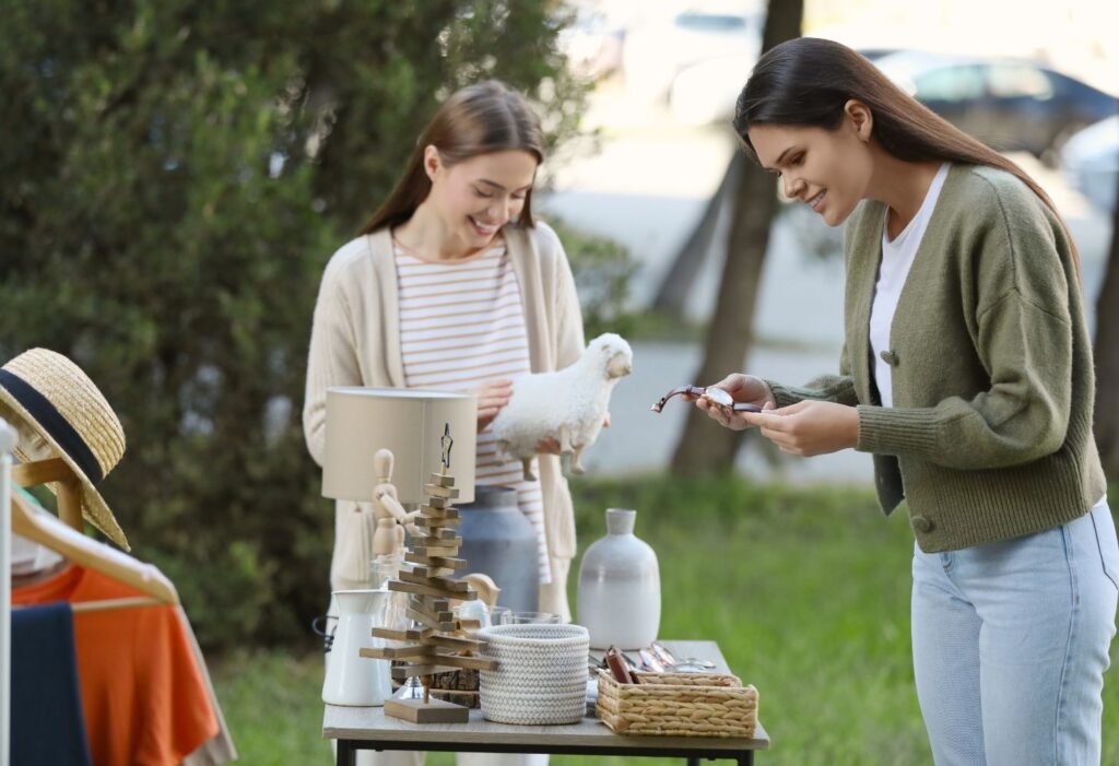 watch and other items for sale in a garage yard