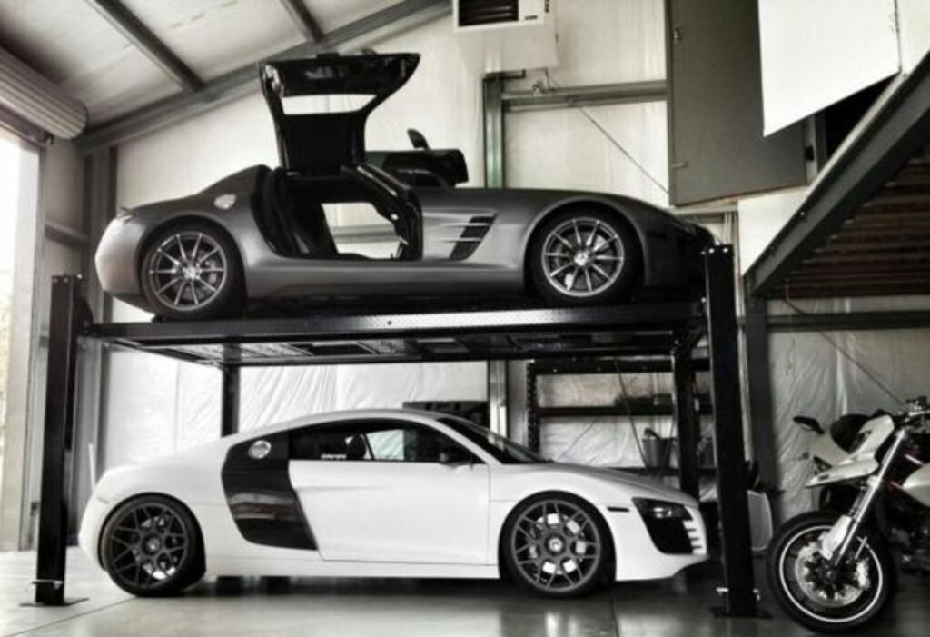 expensive car on a car lift system in a garage